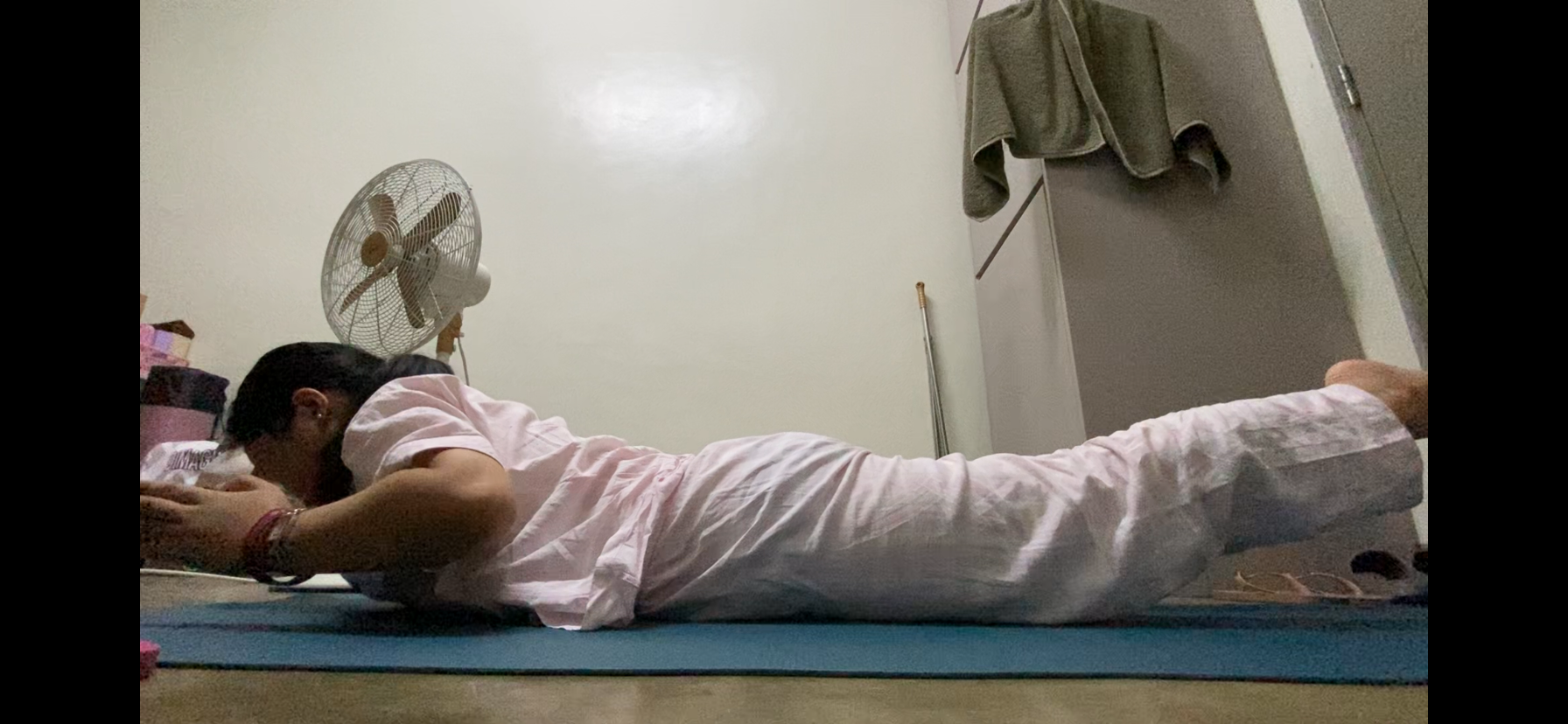 Angel doing mobility pose 2 on Day 1