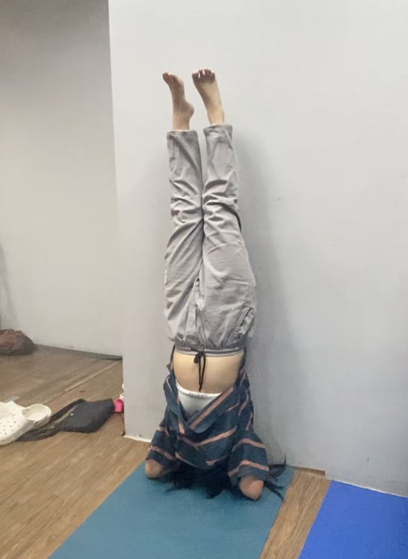 Angel doing Vinaysa Pose 1